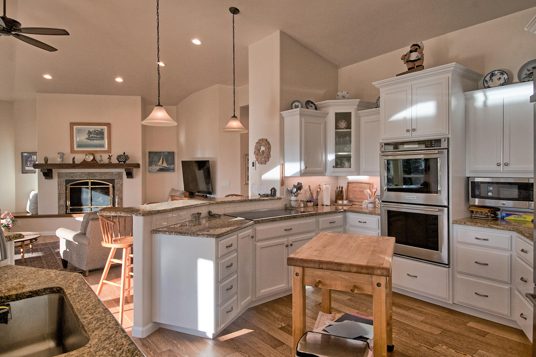 32505 Forwards Ml Road Manton, CA 96059 - Photo 45 of 70 a kitchen with kitchen island granite countertop a stove a sink a oven a dining table and chairs