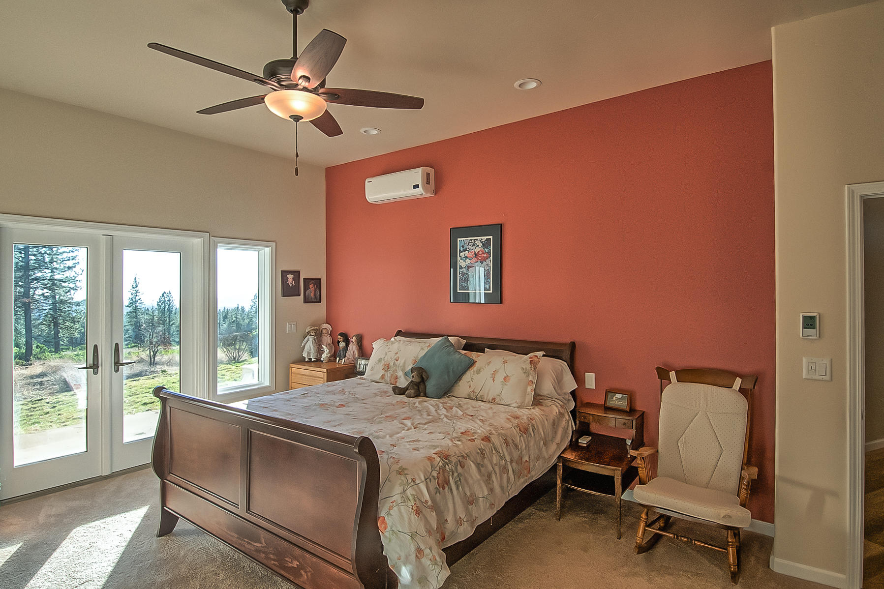 32505 Forwards Ml Road Manton, CA 96059 - Photo 49 of 70 a bedroom with a large bed and a chandelier