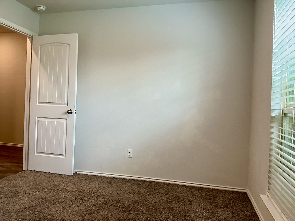 124 Marcel Court Taylor, TX 76574 - Photo 12 of 17 Bedroom 2 with carpet