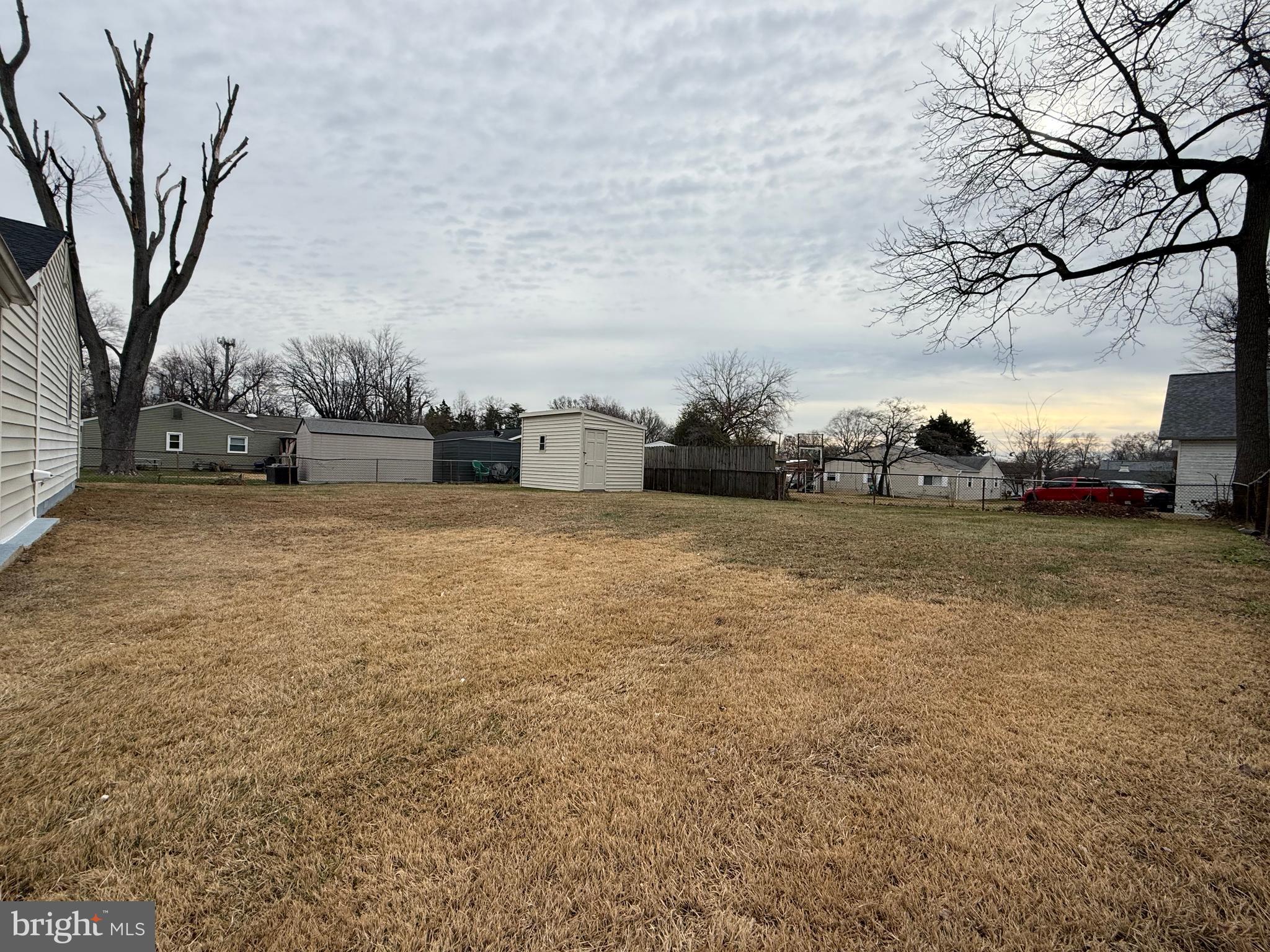 1203 Riggs Court Woodbridge, VA 22191 - Photo 13 of 39 a view of a yard with an trees