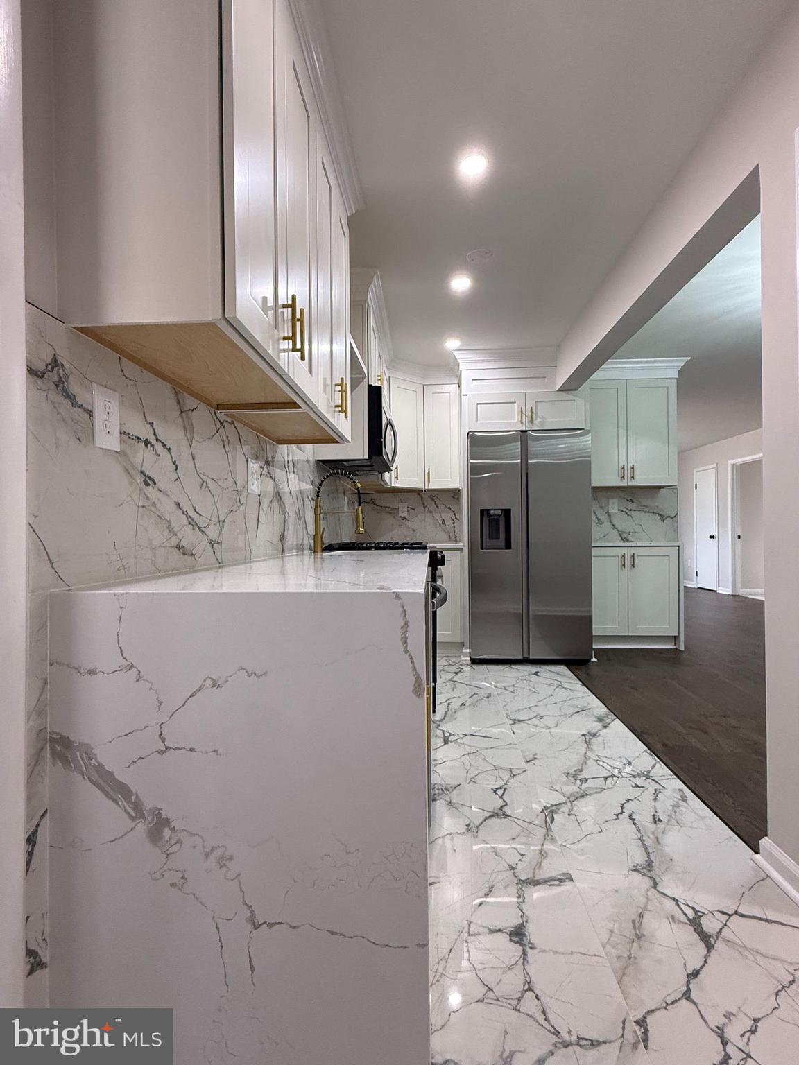 1203 Riggs Court Woodbridge, VA 22191 - Photo 23 of 39 a view of kitchen with refrigerator and cabinets