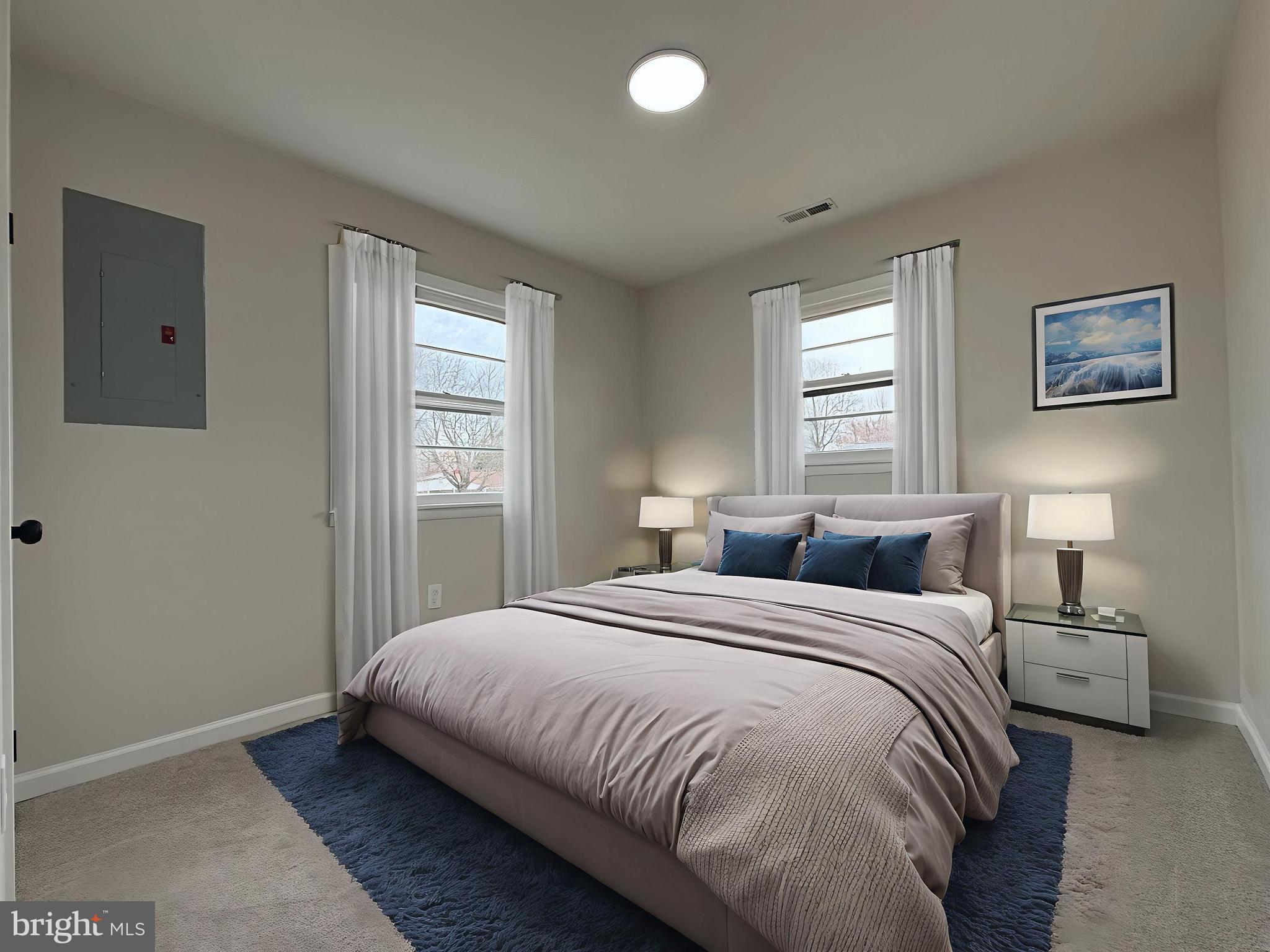 1203 Riggs Court Woodbridge, VA 22191 - Photo 27 of 39 a bedroom with a bed and a window