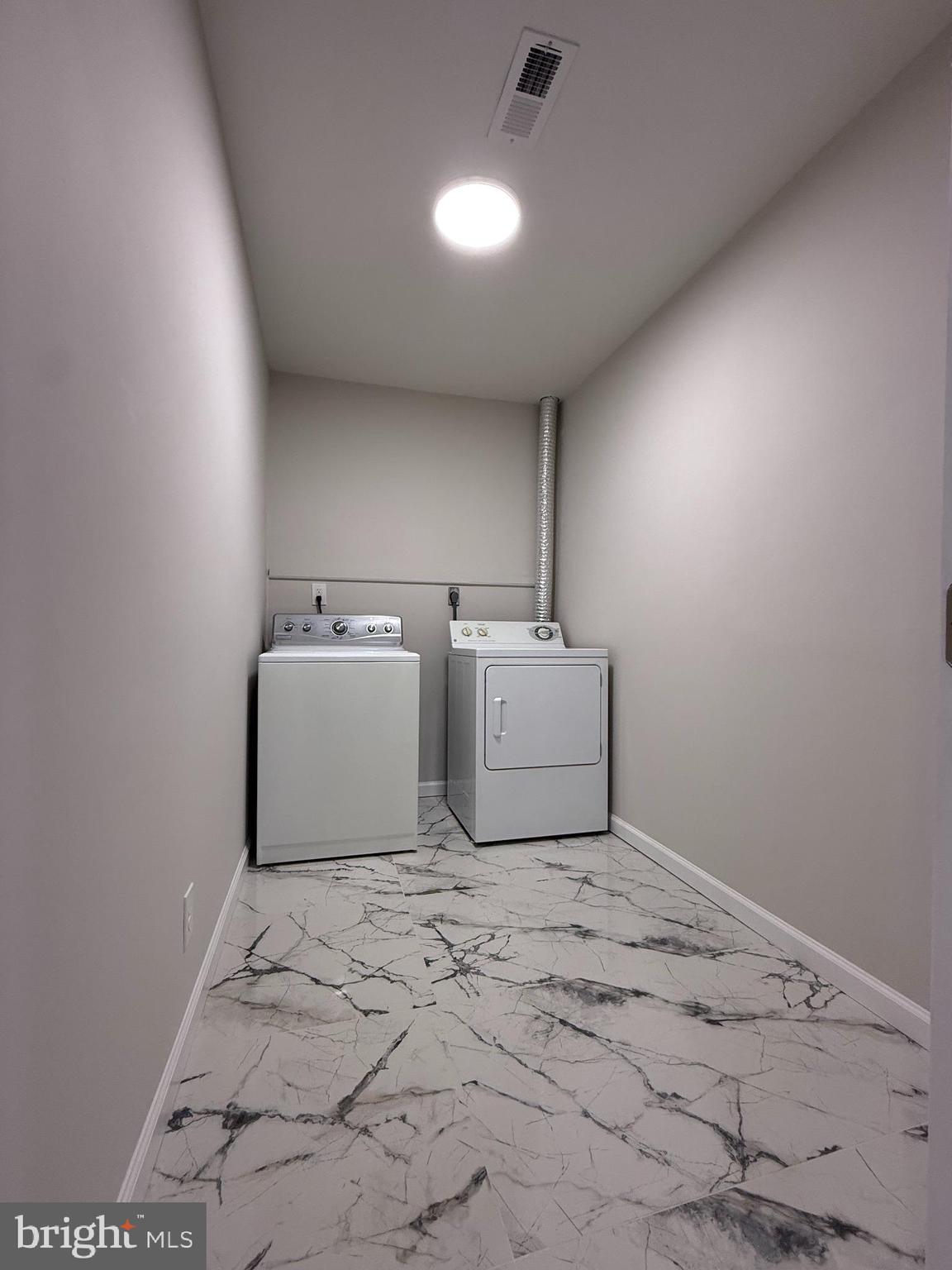 1203 Riggs Court Woodbridge, VA 22191 - Photo 32 of 39 a utility room with washer and dryer