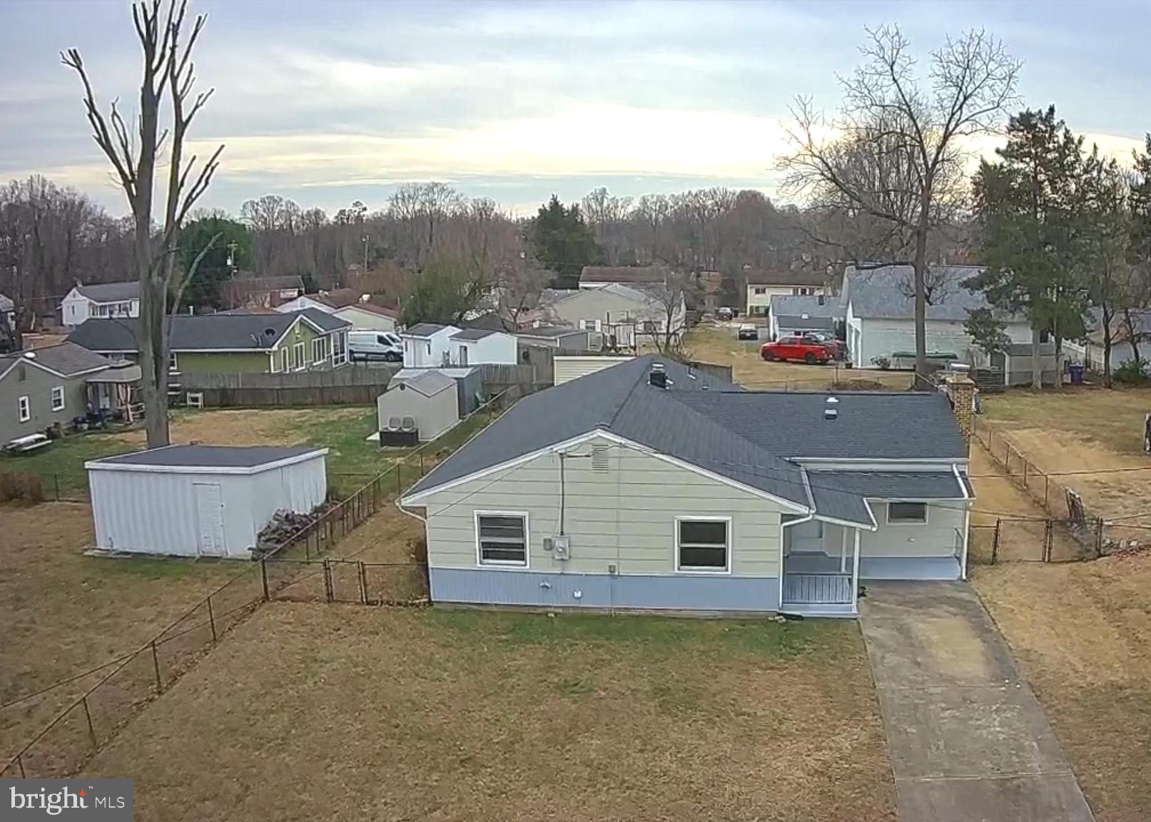 1203 Riggs Court Woodbridge, VA 22191 - Photo 4 of 39 a aerial view of a house with a yard