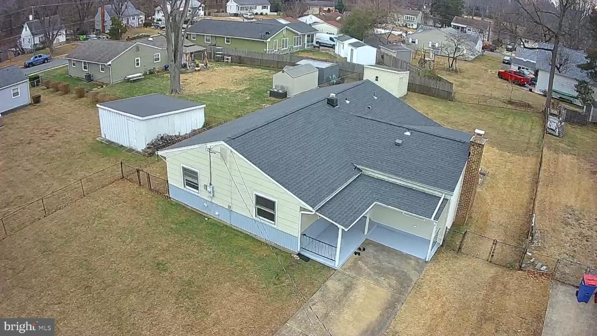 1203 Riggs Court Woodbridge, VA 22191 - Photo 7 of 39 an aerial view of a house with a yard