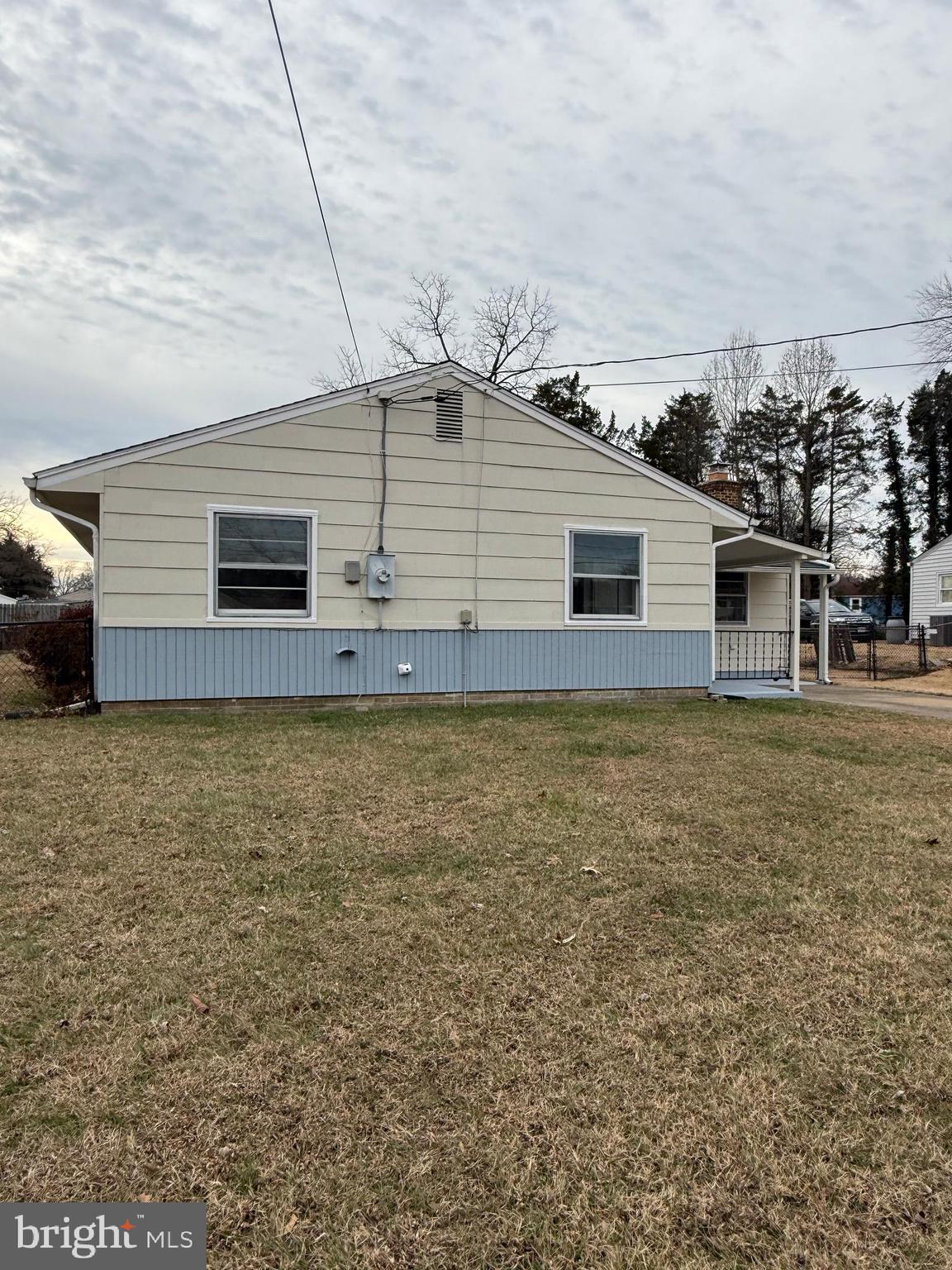 1203 Riggs Court Woodbridge, VA 22191 - Photo 8 of 39 a view of a house with a yard