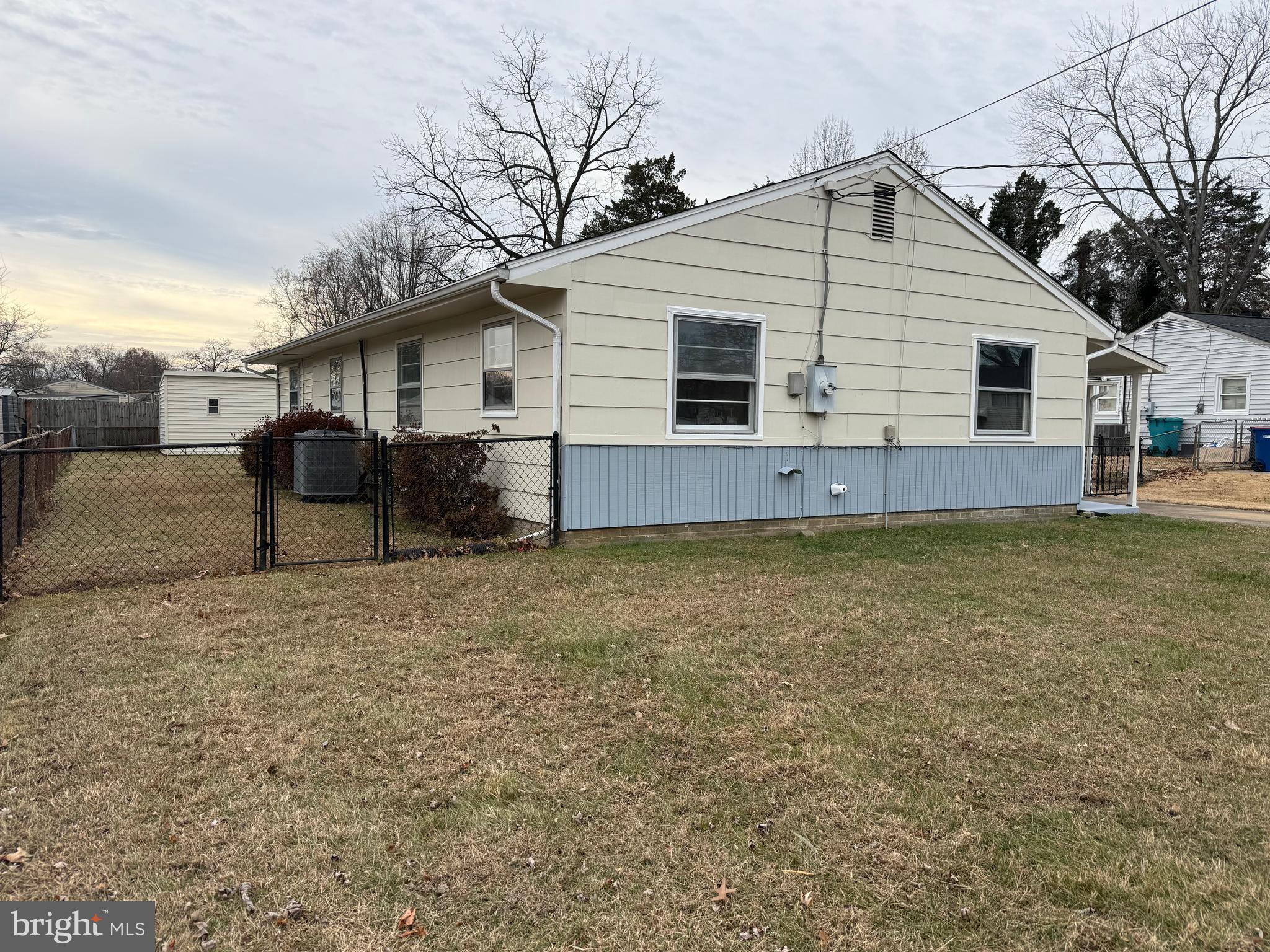1203 Riggs Court Woodbridge, VA 22191 - Photo 9 of 39 a house view with a backyard space