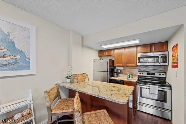 $275,000 | 1 Bluebill Avenue, Unit 402, Naples, FL 34108