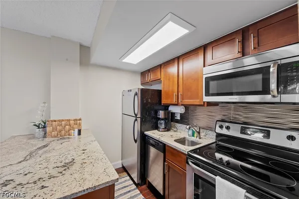 $275,000 | 1 Bluebill Avenue, Unit 402, Naples, FL 34108