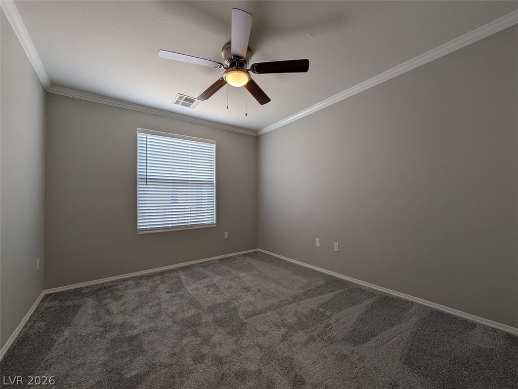 10308 Faustine Avenue Las Vegas, NV 89129 - Photo 19 of 28 An inviting sleeping space with new carpeting and a convenient ceiling fan for year-round comfort.