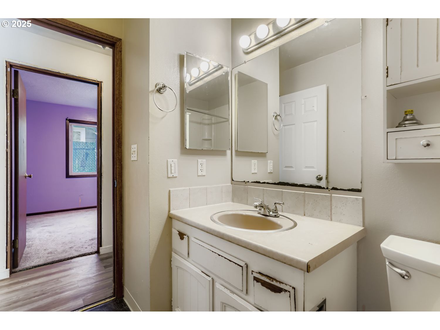 6524 Southeast 86th Avenue Portland, OR 97266 - Photo 22 of 30 a bathroom with a sink and a mirror