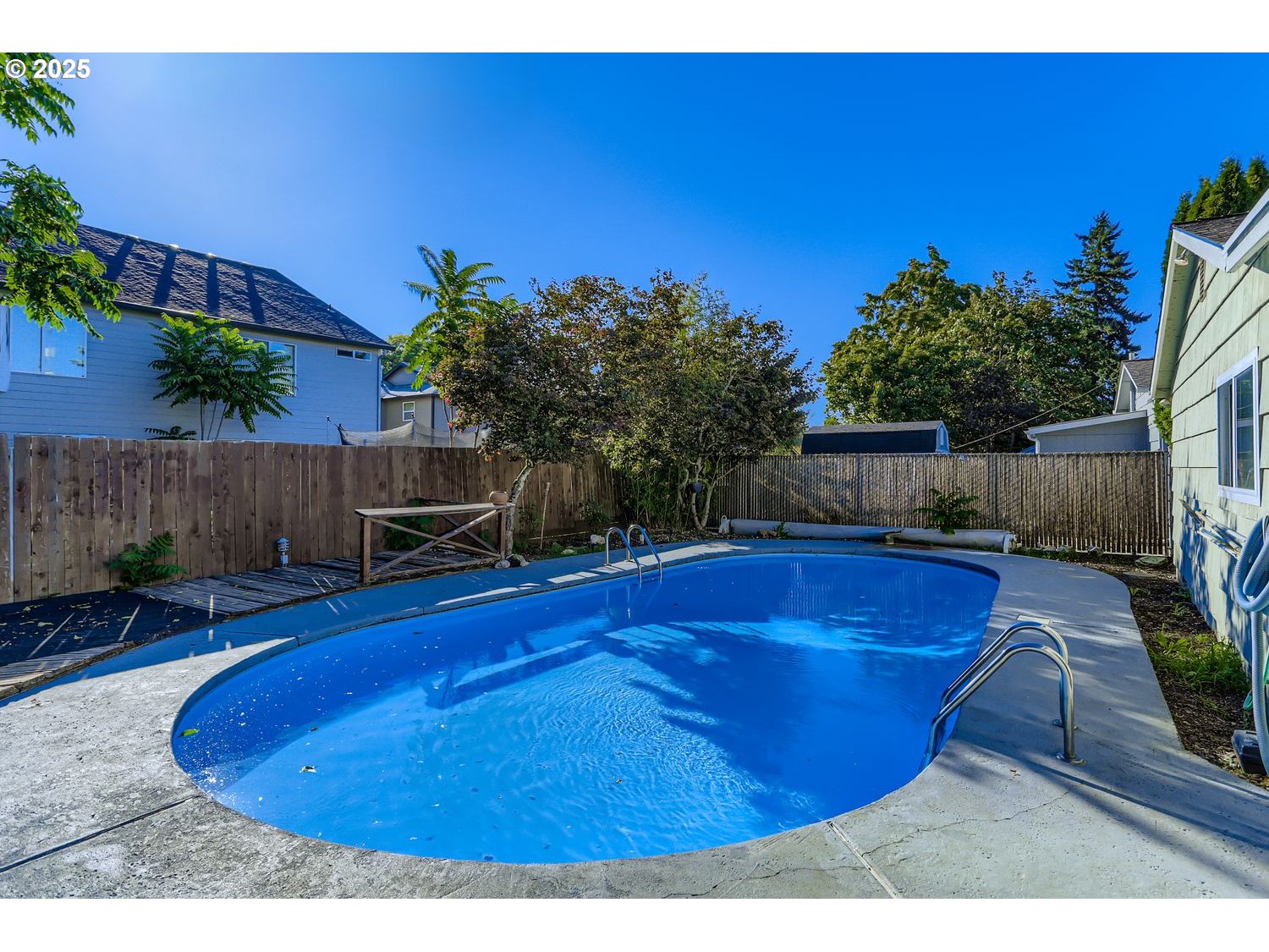 6524 Southeast 86th Avenue Portland, OR 97266 - Photo 26 of 30 a view of a swimming pool with a yard