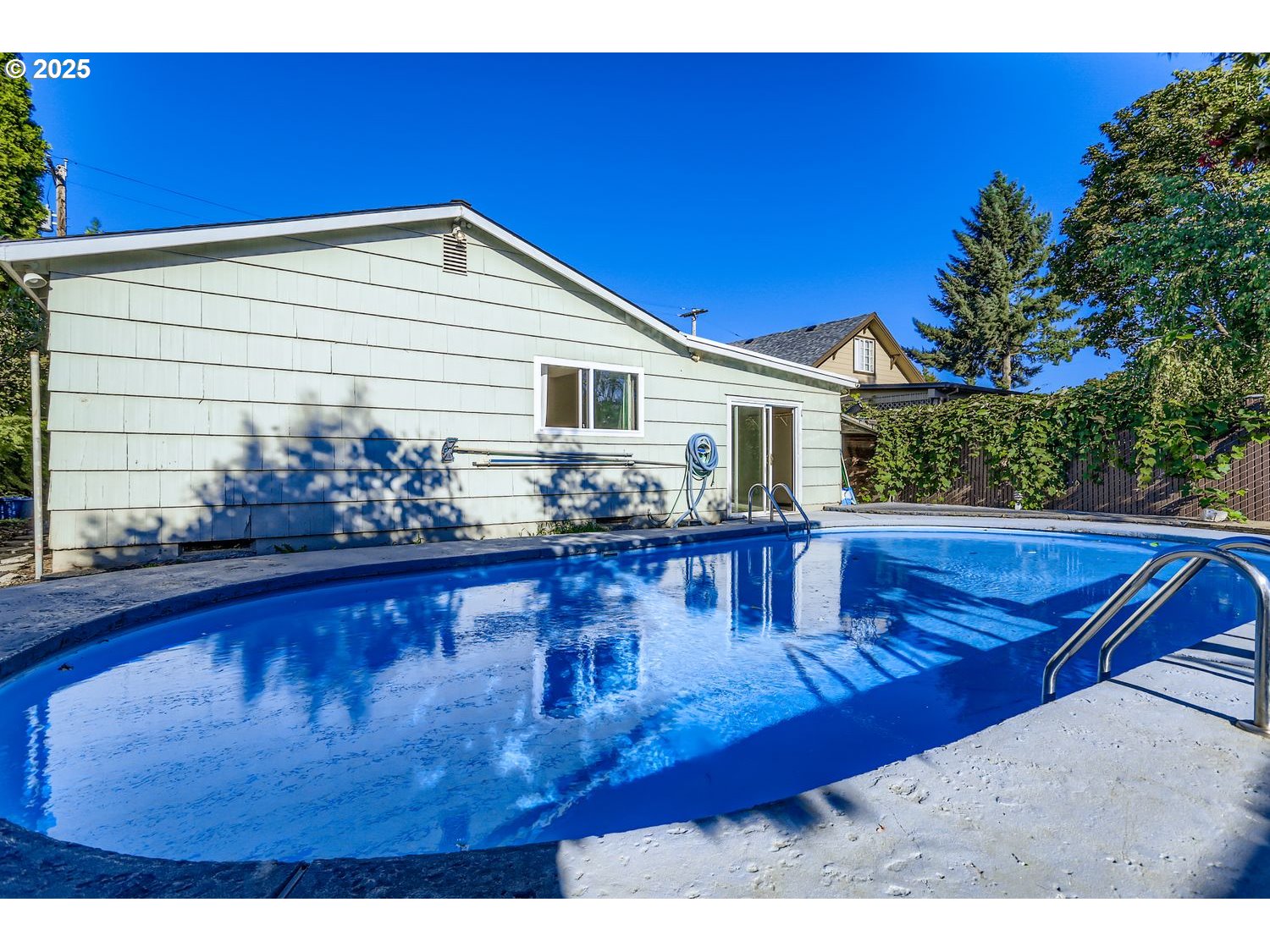 6524 Southeast 86th Avenue Portland, OR 97266 - Photo 29 of 30 a view of a house with swimming pool