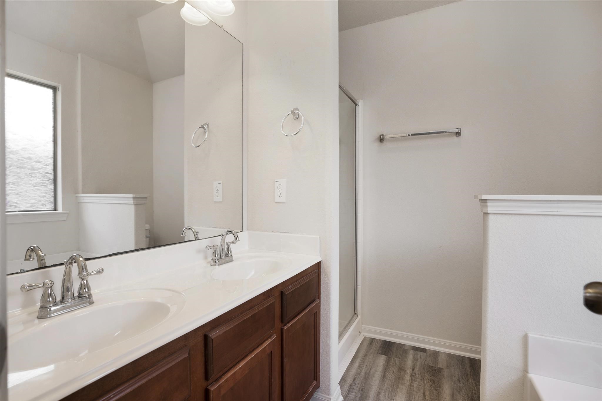 384 Decoster Boulevard Alvin, TX 77511 - Photo 21 of 27 a bathroom with a sink and a mirror
