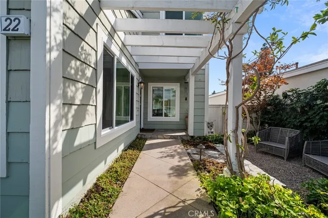 a front view of a house with a glass windows