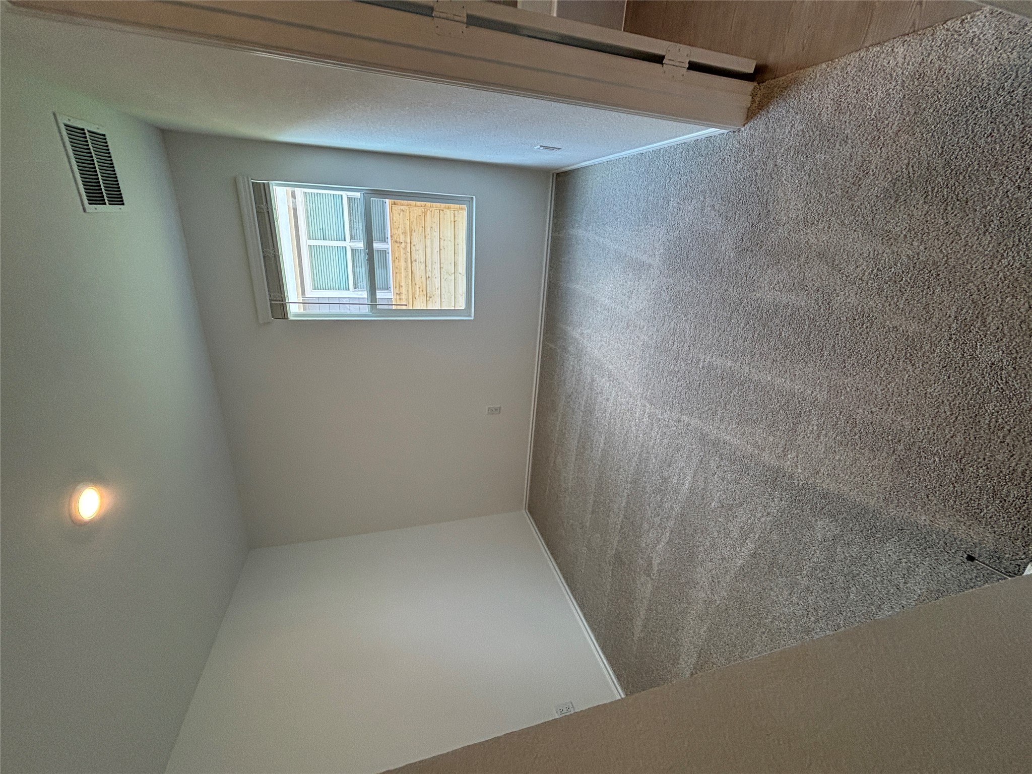 3262 Everett Kyle, TX 78640 - Photo 12 of 24 Spare room with light colored carpet and recessed lighting