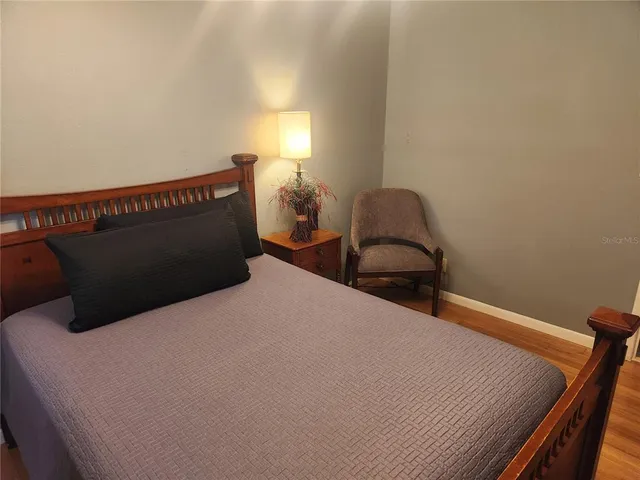 a view of walk in closet with clothes