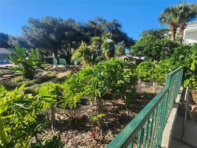 a view of a swimming pool with a lake view
