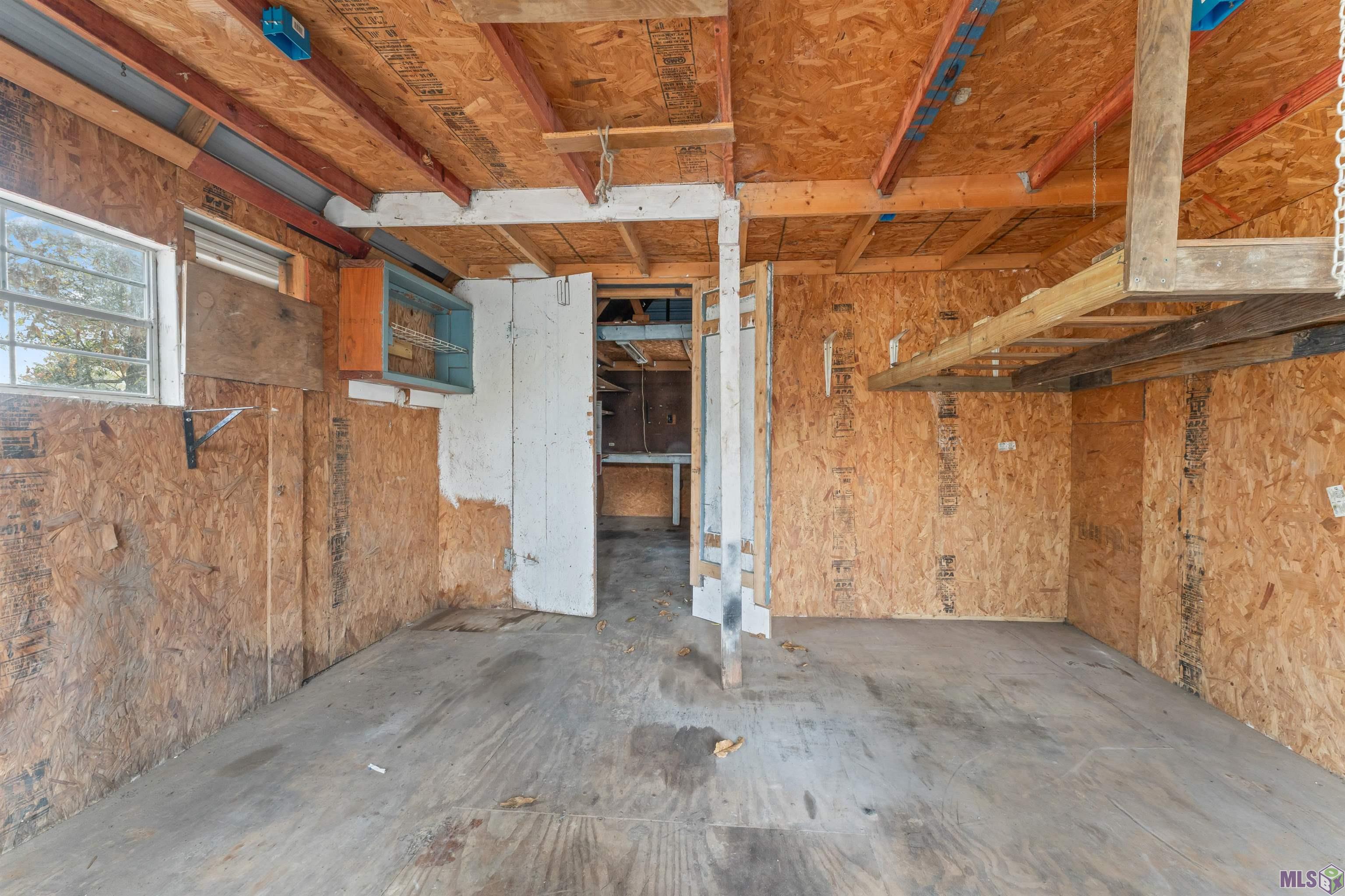 12734 Mustang Avenue Baton Rouge, LA 70818 - Photo 32 of 33 Outbuilding Interior (Front Section)