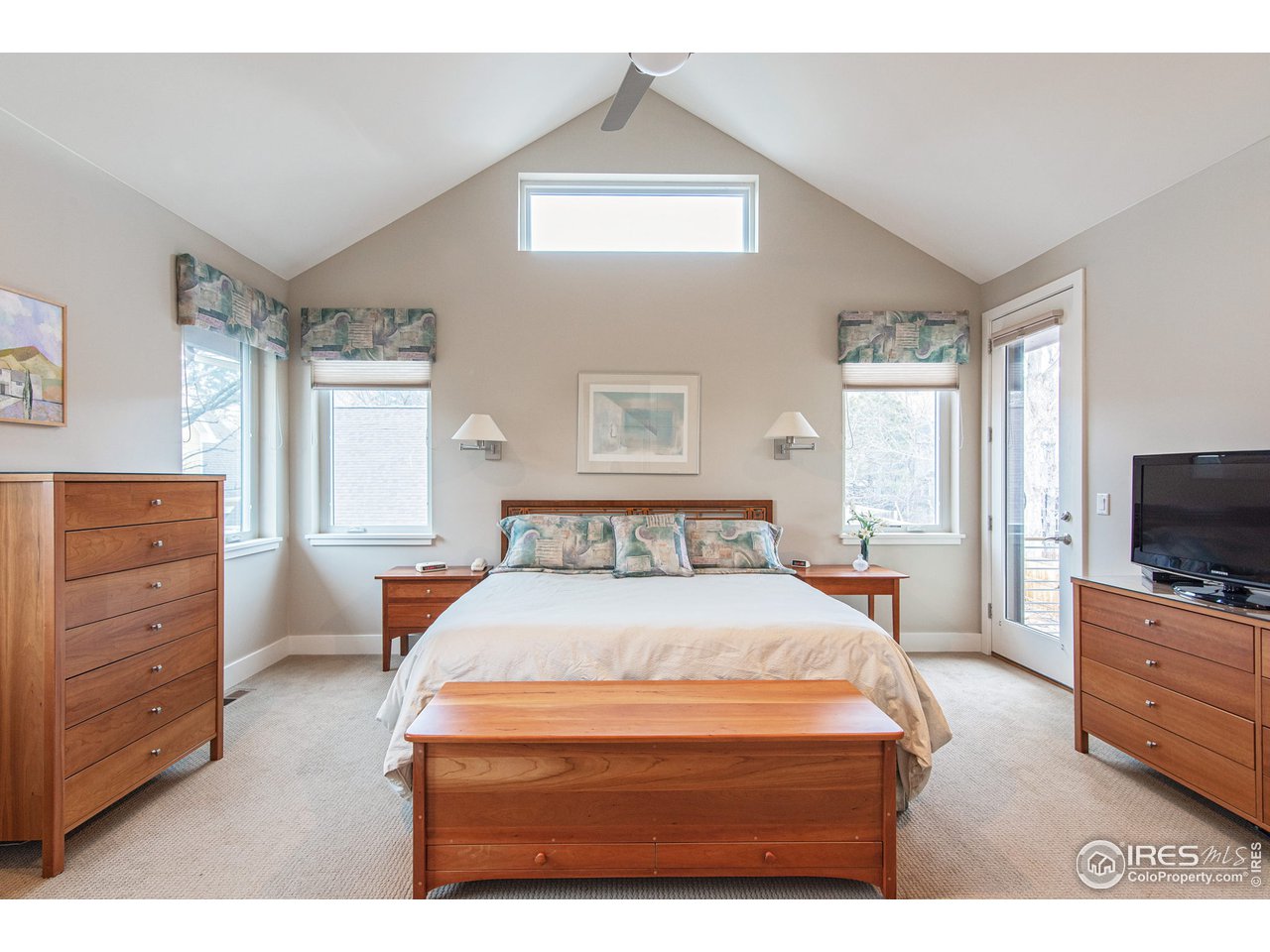 3969 Springleaf Lane Boulder, CO 80304 - Photo 19 of 40 Primary bedroom with vaulted ceilings, 2 walk in closets