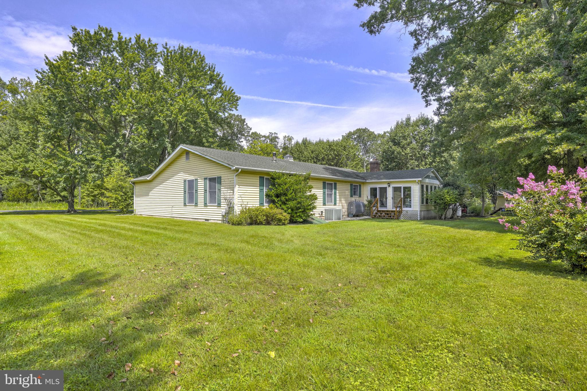 4949 Idlewilde Road Shady Side, MD 20764 - Photo 30 of 31 a front view of house with yard and green space