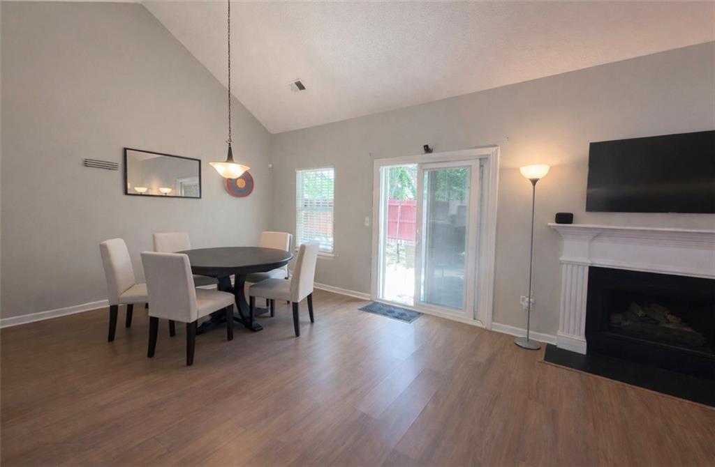 3804 Benjamin Court Southwest Atlanta, GA 30331 - Photo 7 of 13 a view of a dining room with furniture window and wooden floor