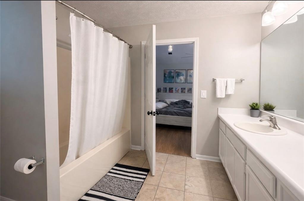 3804 Benjamin Court Southwest Atlanta, GA 30331 - Photo 10 of 13 a bathroom with a sink and a mirror