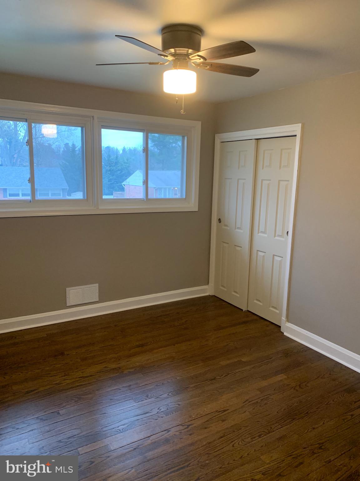 28 Othoridge Road Lutherville-Timonium, MD 21093 - Photo 11 of 27 a view of an empty room with wooden floor and a window