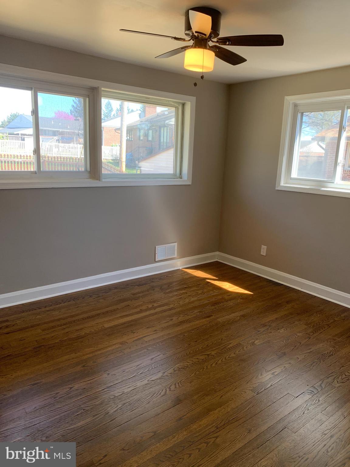 28 Othoridge Road Lutherville-Timonium, MD 21093 - Photo 13 of 27 a view of an empty room with wooden floor and a window