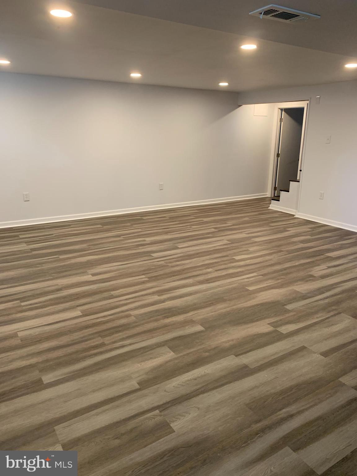 28 Othoridge Road Lutherville-Timonium, MD 21093 - Photo 18 of 27 an empty room with wooden floor
