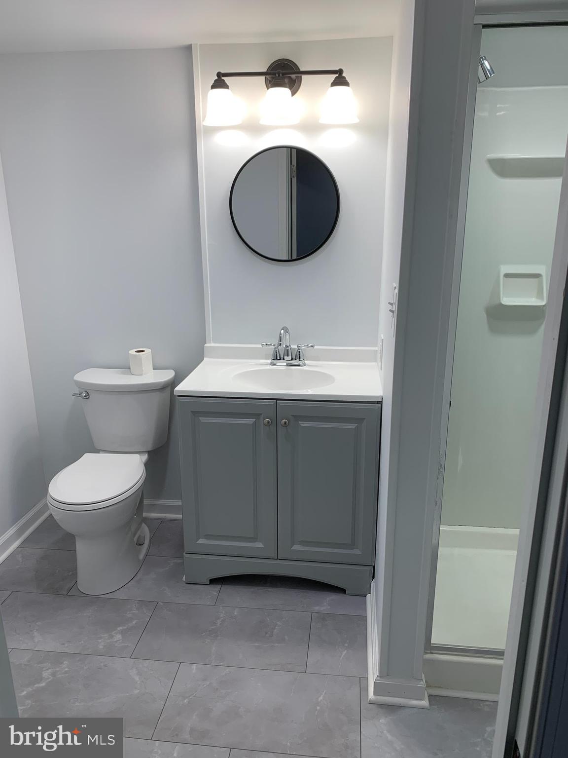 28 Othoridge Road Lutherville-Timonium, MD 21093 - Photo 20 of 27 a bathroom with a toilet and a sink