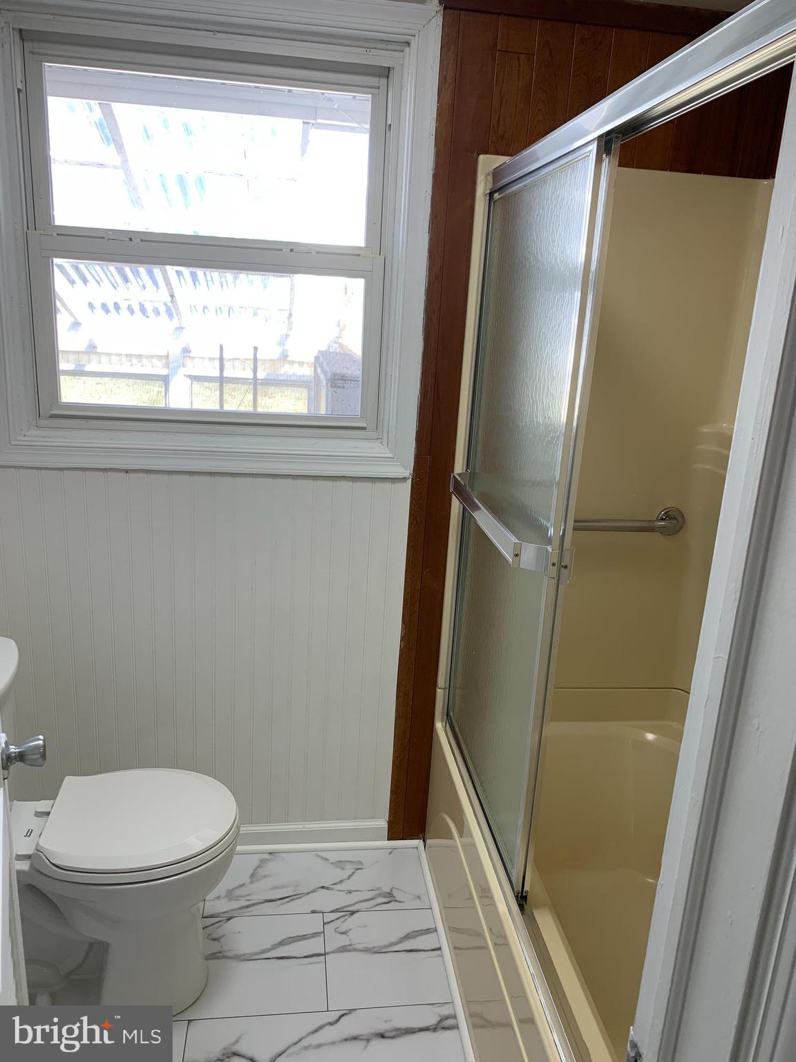 28 Othoridge Road Lutherville-Timonium, MD 21093 - Photo 9 of 27 a bathroom with a toilet and a shower