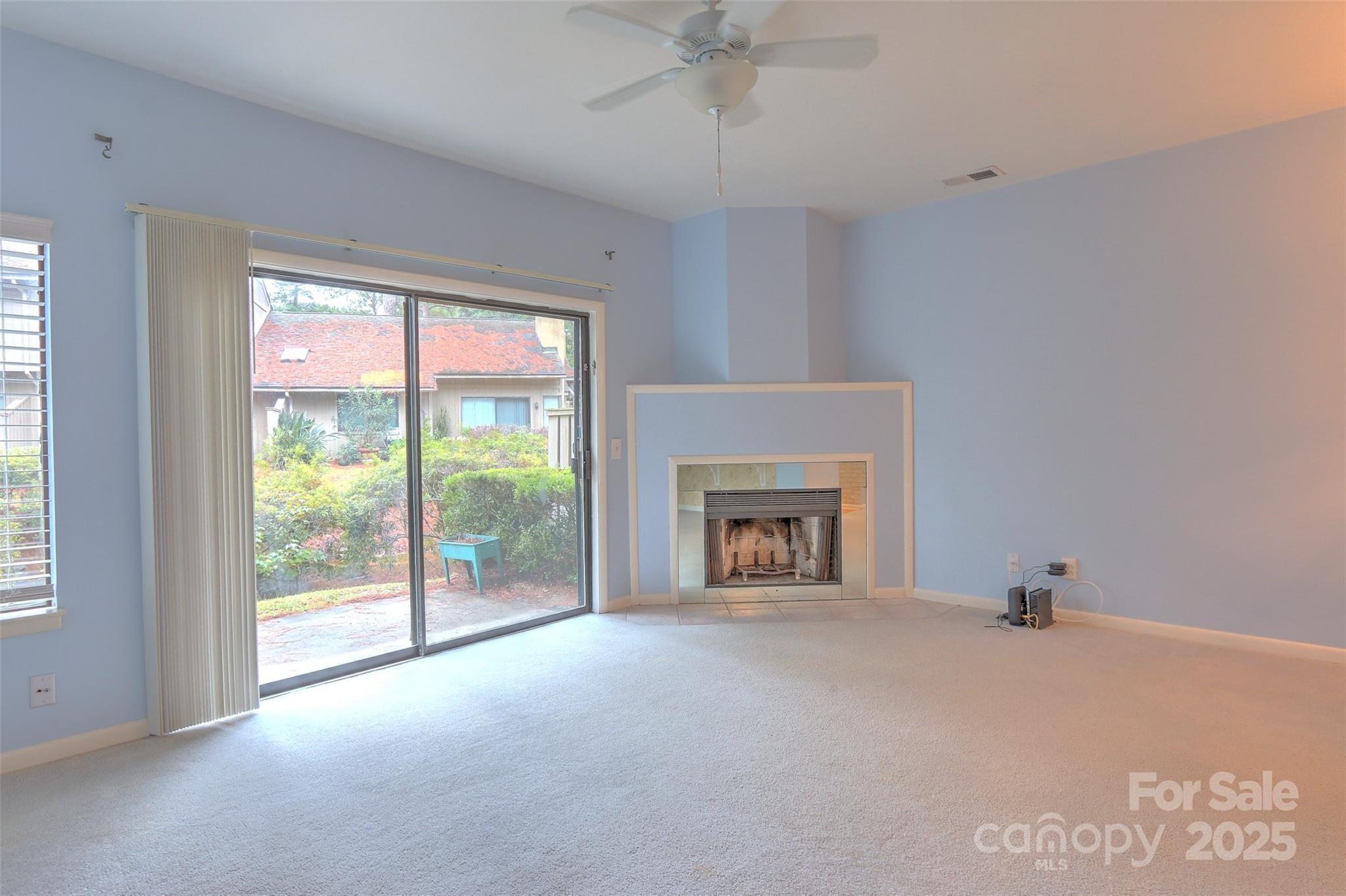 5 Gumtree Road, Unit D3 Hilton Head Island, SC 29926 - Photo 8 of 17 a view of an empty room with a fireplace