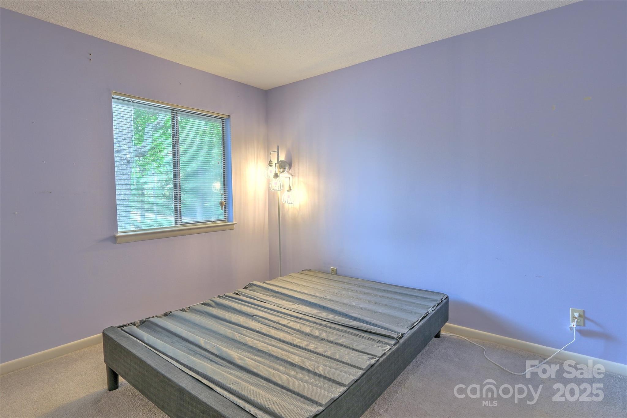 5 Gumtree Road, Unit D3 Hilton Head Island, SC 29926 - Photo 9 of 17 a bedroom with a bed and a window