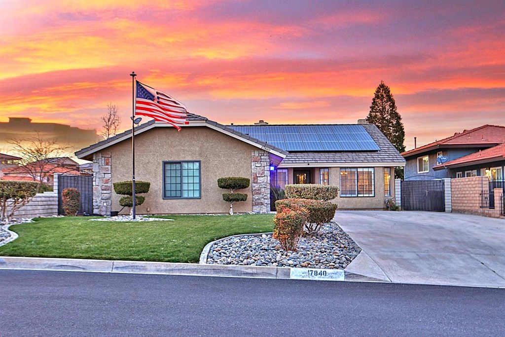 17840 Rancho Bonita Road Victorville, CA 92395 - Photo 1 of 1 a front view of a house with a yard