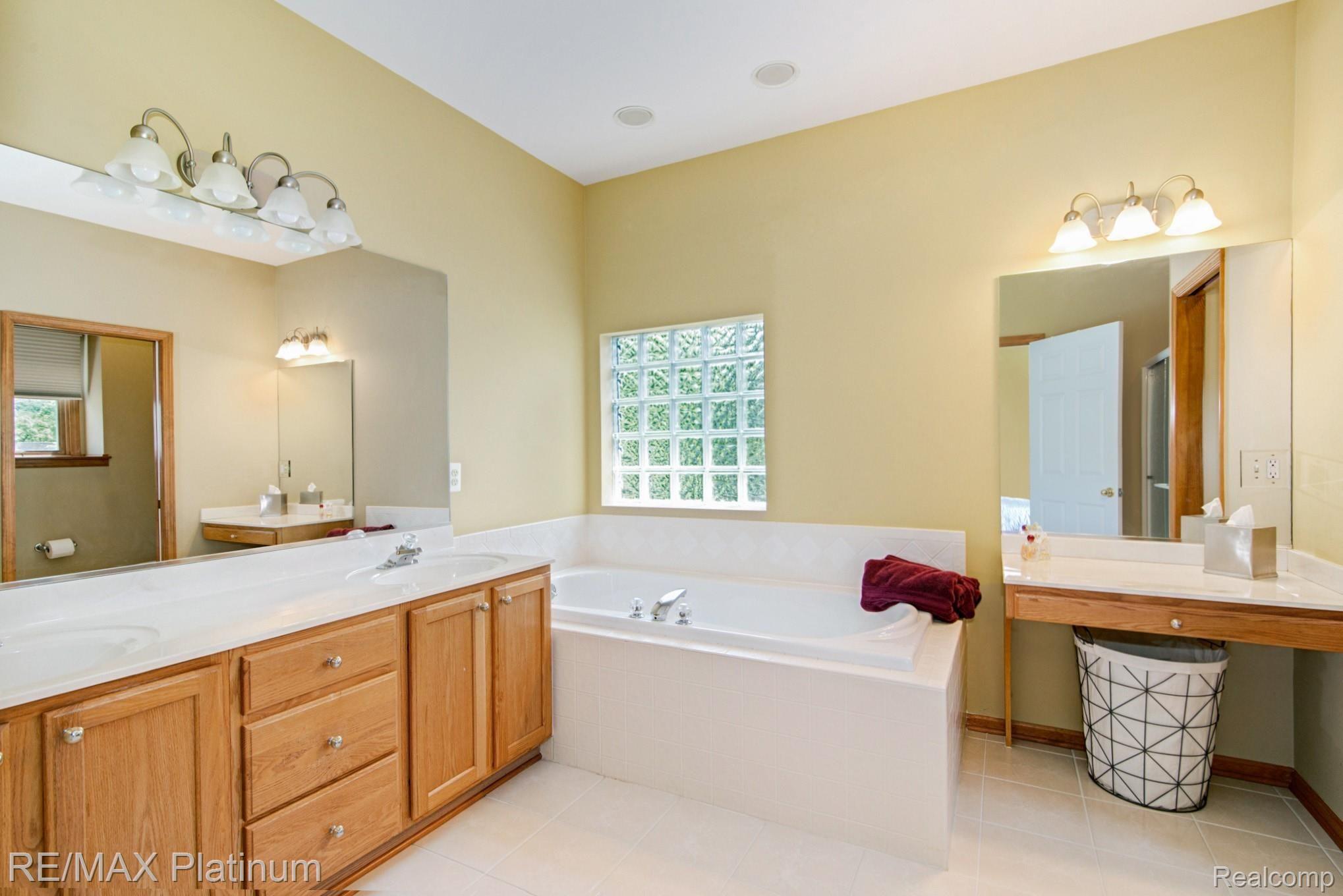 2021 Ricks Court Brighton, MI 48114 - Photo 15 of 36 Master ensuite bath- also has separate shower & water closet