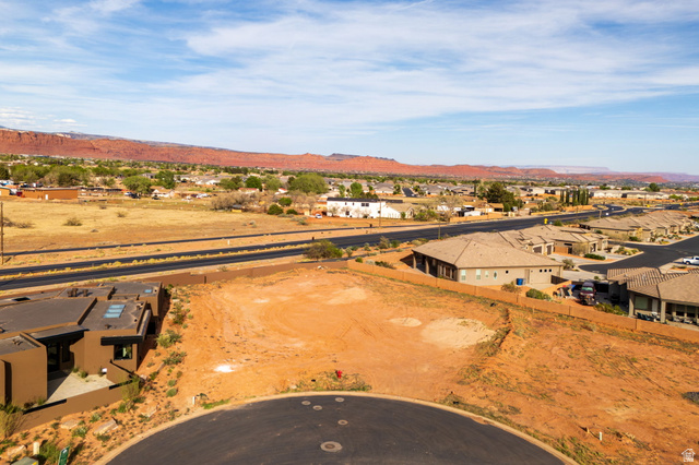 545 Wild Indigo Way, Unit 60 Ivins, UT 84738 - Photo 4 of 15 Aerial view of residential area with a mountain backdrop