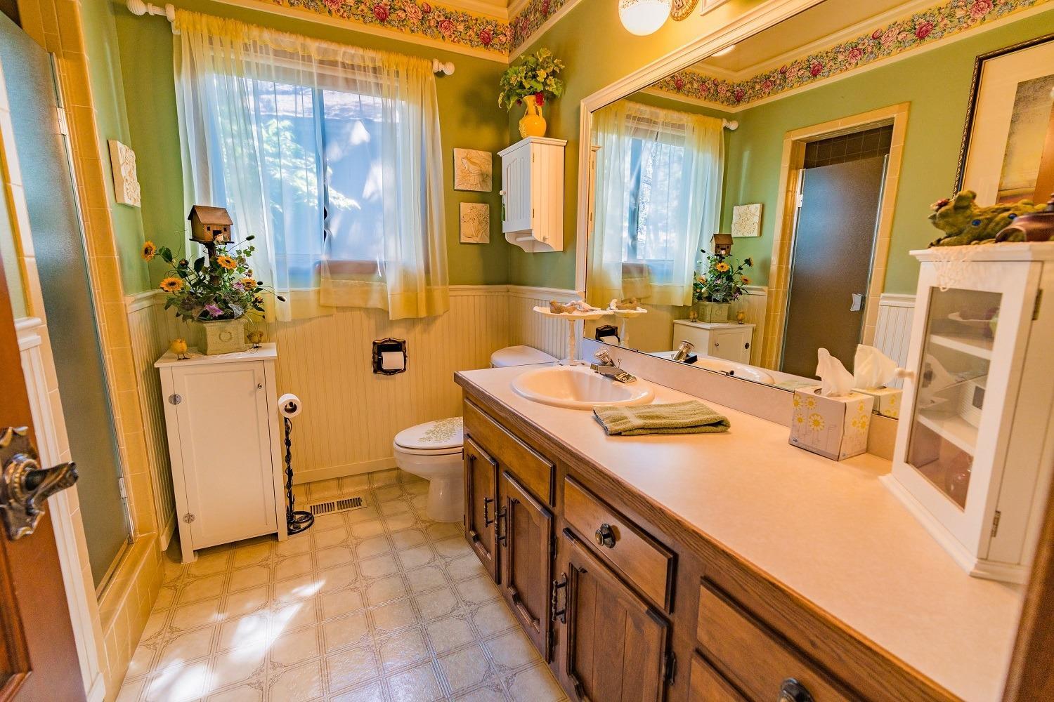 65035 Hopper Road Bend, OR 97703 - Photo 15 of 21 a bathroom with a sink a toilet and shower