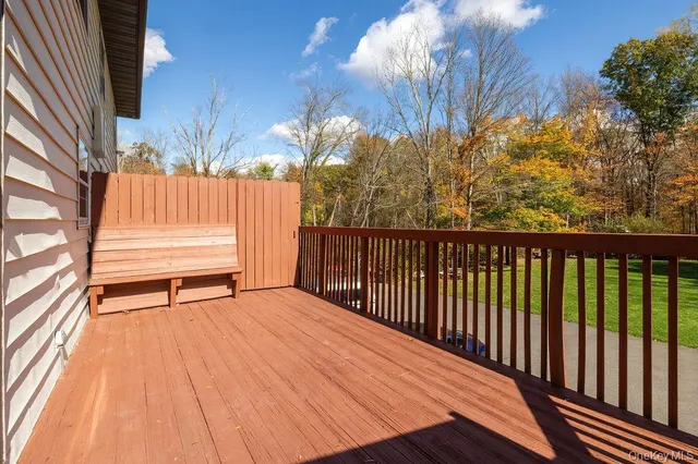 a view of outdoor space with deck and a garden
