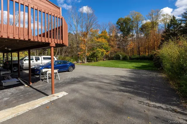 a view of outdoor space with wooden fence