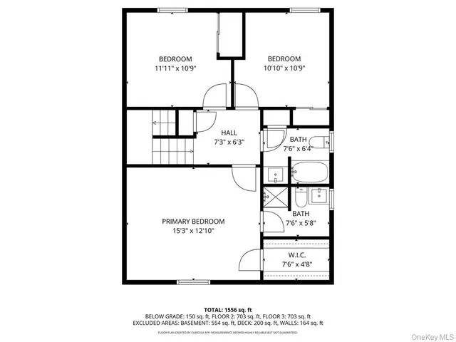 a picture of a bench in front of a wall