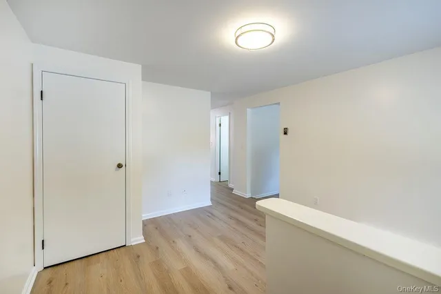 a view of wooden floor in an empty room