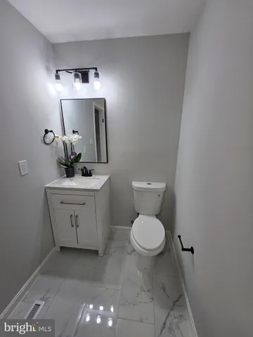 a spacious bathroom with a bathtub and a shower