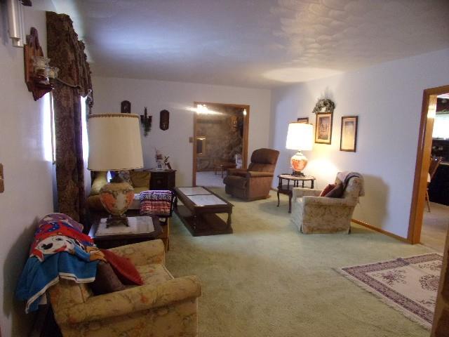 533 Acme Street Rimersburg, PA 16248 - Photo 12 of 26 a living room with furniture and a lamp
