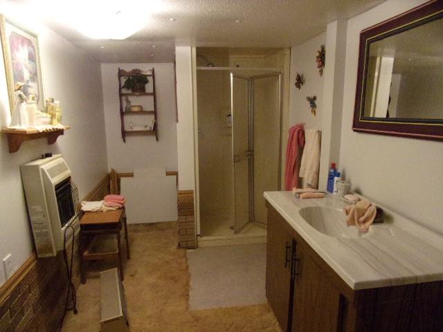 533 Acme Street Rimersburg, PA 16248 - Photo 17 of 26 a bathroom with a sink vanity and a mirror