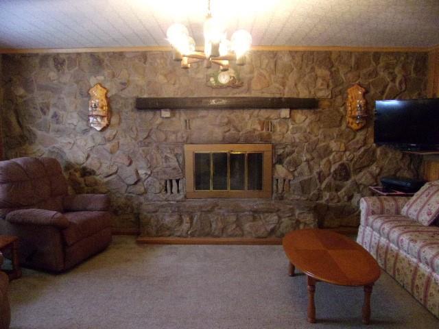 533 Acme Street Rimersburg, PA 16248 - Photo 3 of 26 a living room with furniture and a fireplace