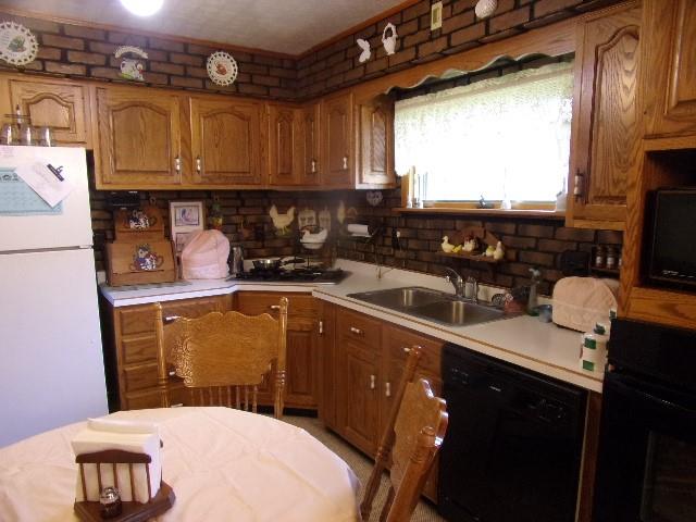 533 Acme Street Rimersburg, PA 16248 - Photo 5 of 26 a kitchen with a sink a stove and cabinets