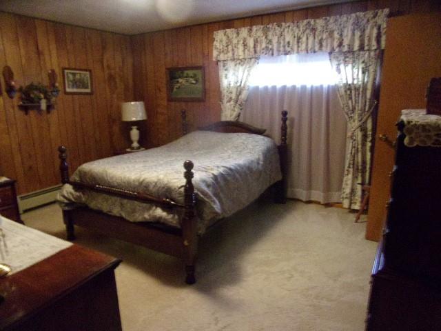 533 Acme Street Rimersburg, PA 16248 - Photo 10 of 26 a bed sitting in a spacious bedroom next to a window