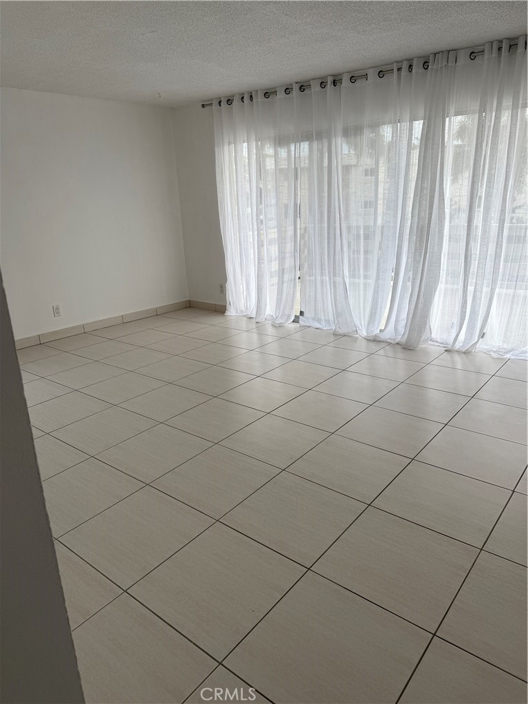 308 Avenida Granada, Unit A San Clemente, CA 92672 - Photo 9 of 9 an empty room with a window