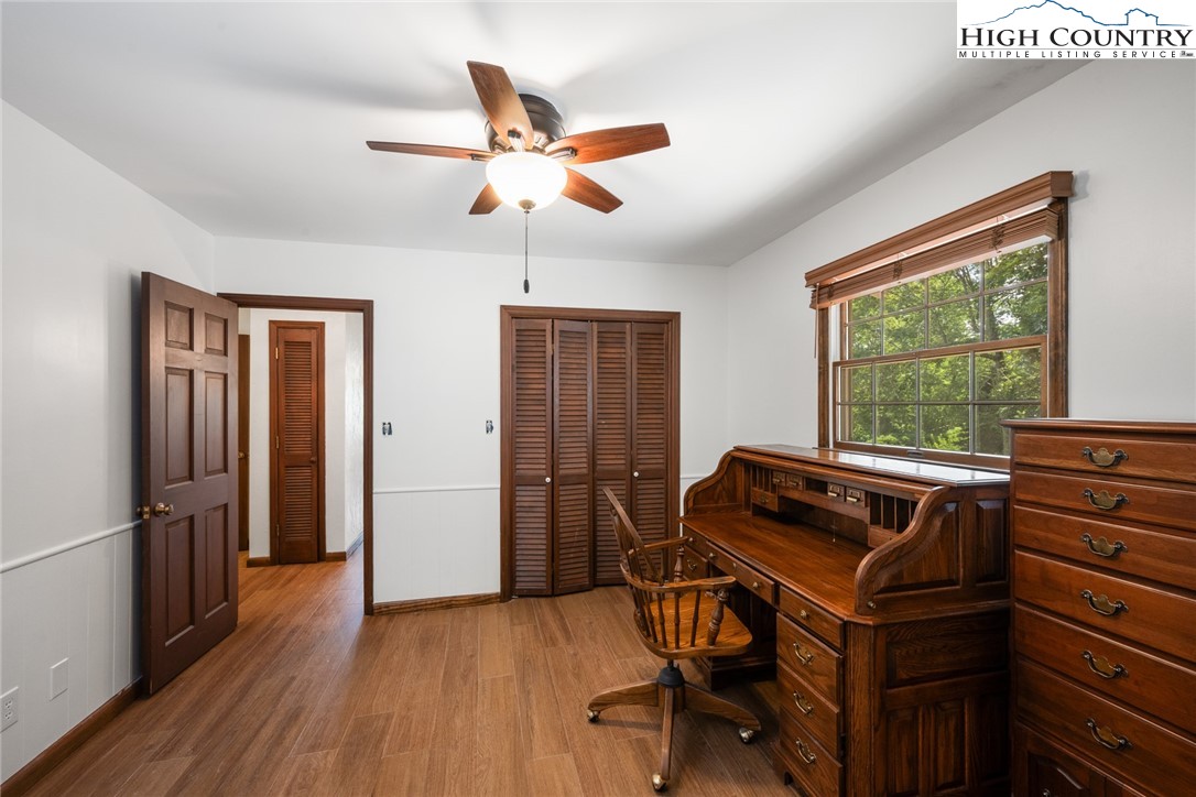 281 Cliffside Lane Seven Devils, NC 28604 - Photo 22 of 29 a room with furniture and windows